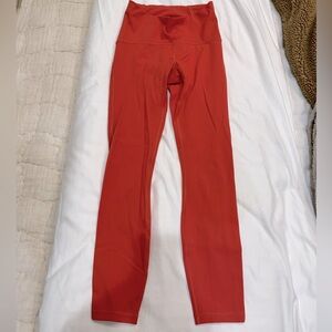 Lululemon size 4 tights- orange